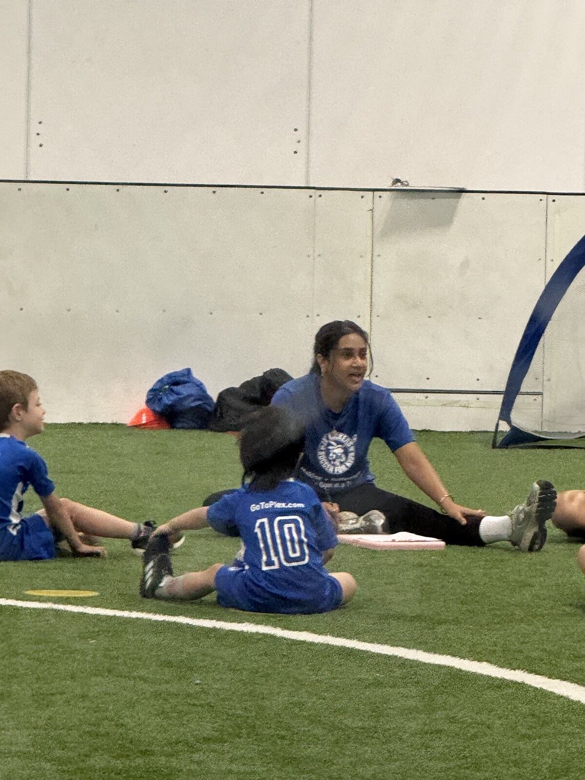 Jichang stretching during soccer lesson