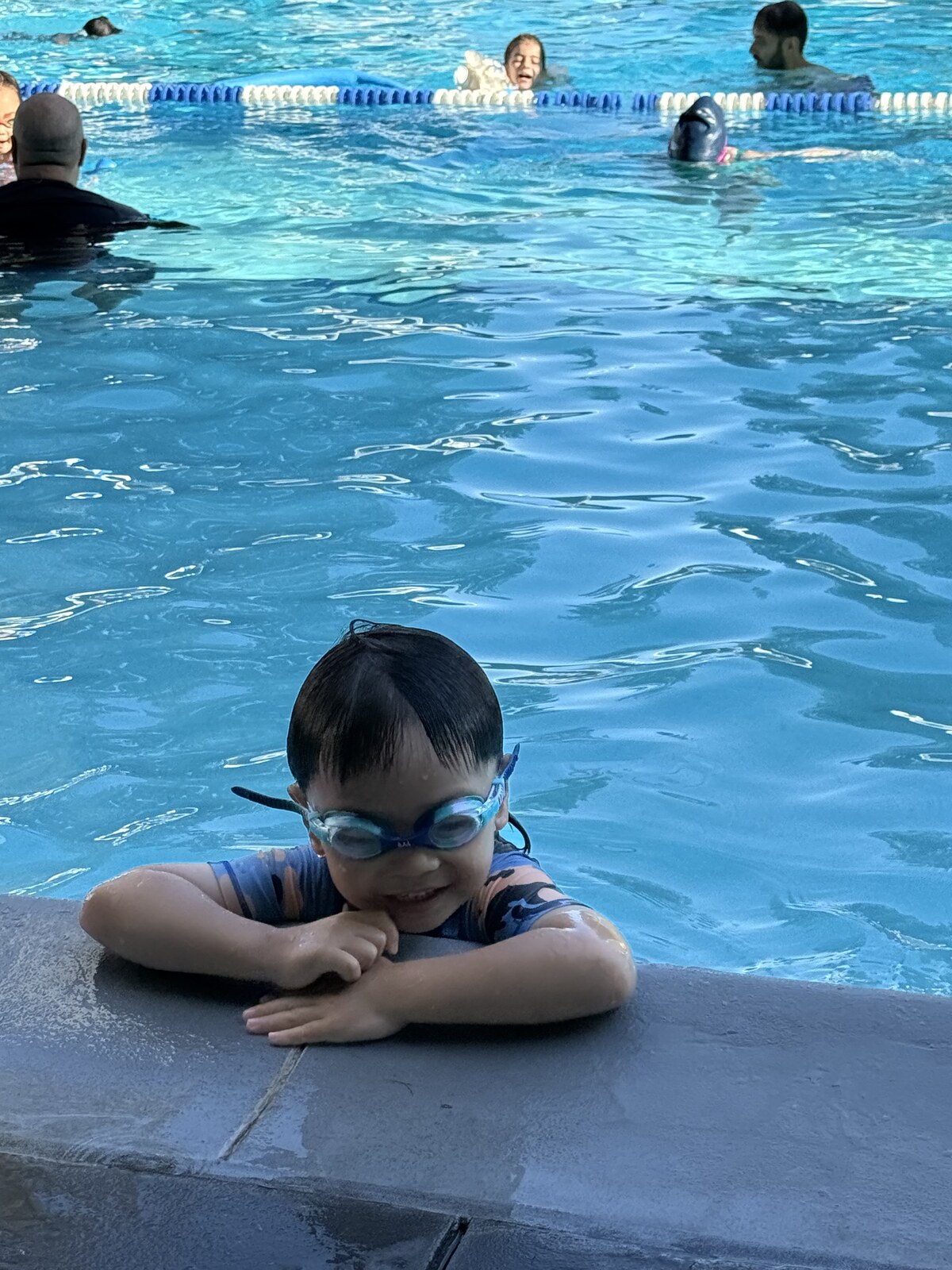 Jichang climbing out of the pool after extra play time