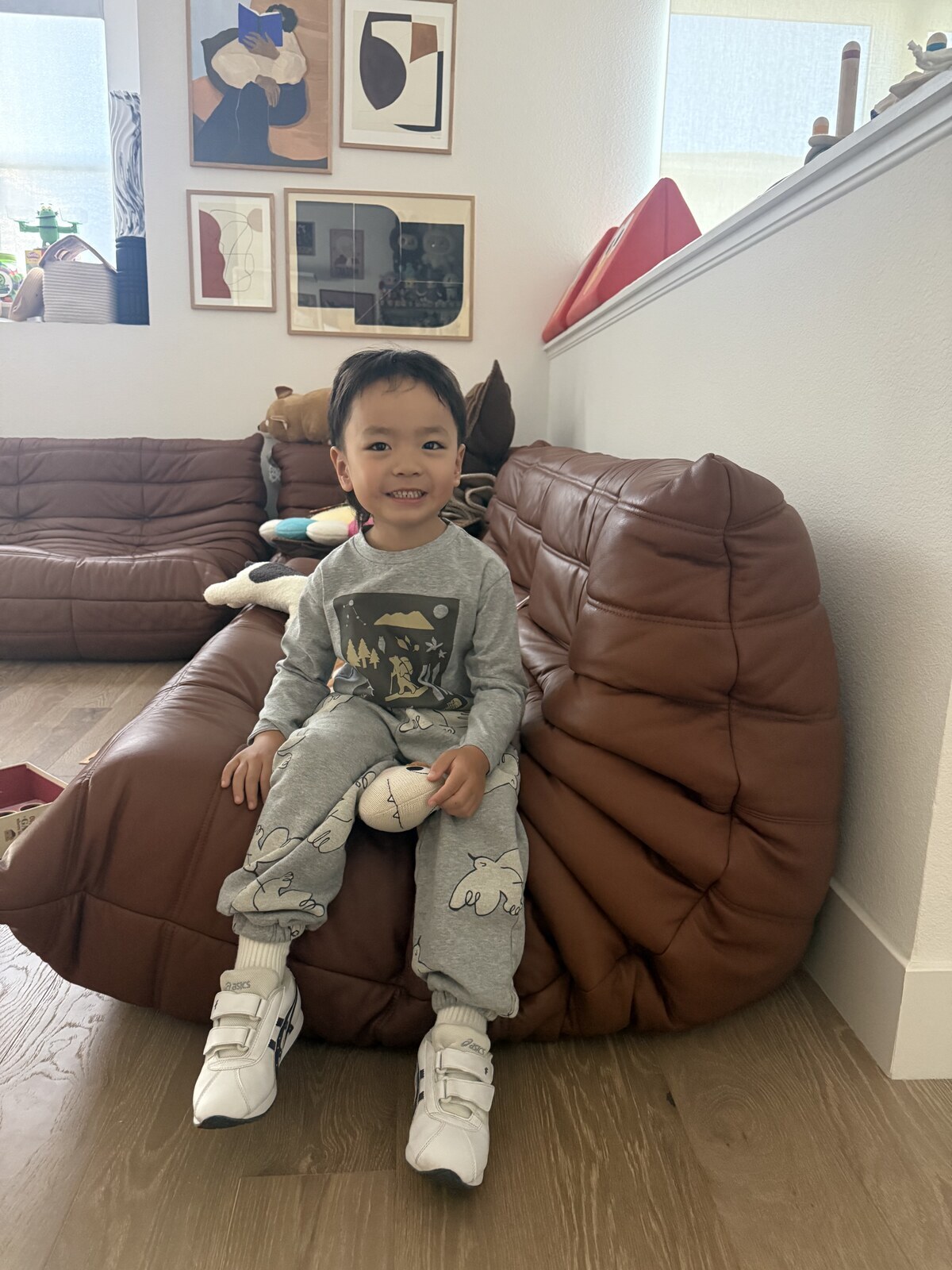 Jichang sitting at home dressed and ready for a whale watching trip