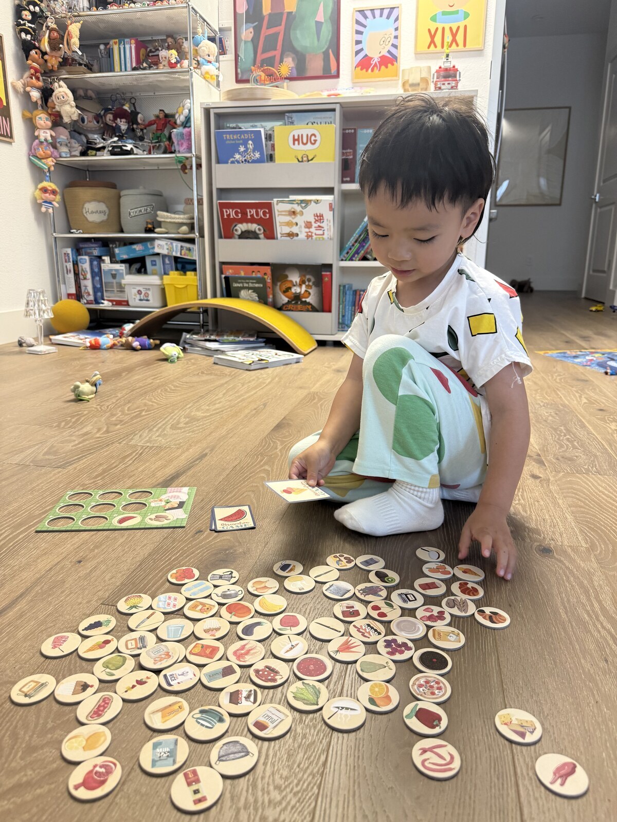 Jichang playing a game on the floor at home